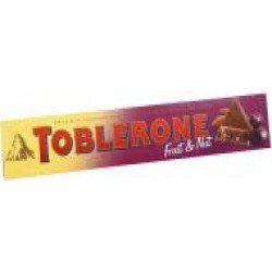 Шоколад TOBLERONE молочний з родзинками і нугою 100 г